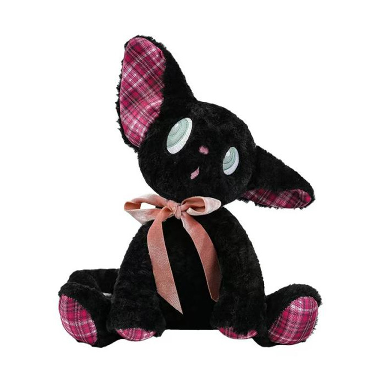 Bedårande avlyssnande kattunge plyschleksak