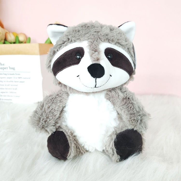 Raccoon plyschleksak med stor fluffig svans